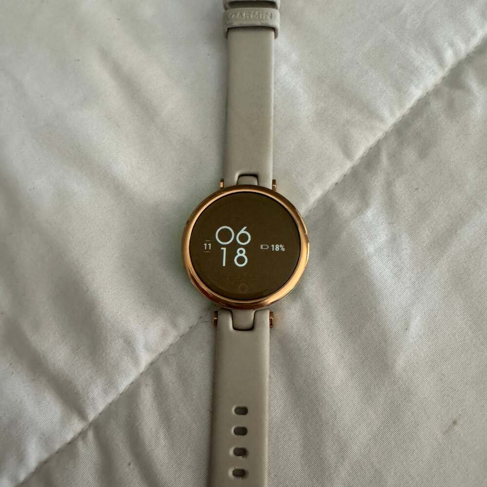 Garmin Lily Sport Edition Small Smartwatch in Rose Gold with Light Sand Band